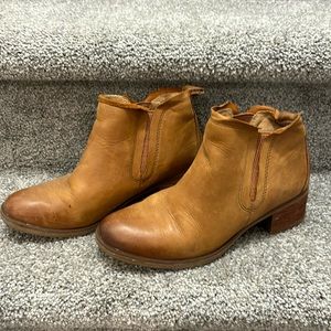 Vintage style booties worn in look.